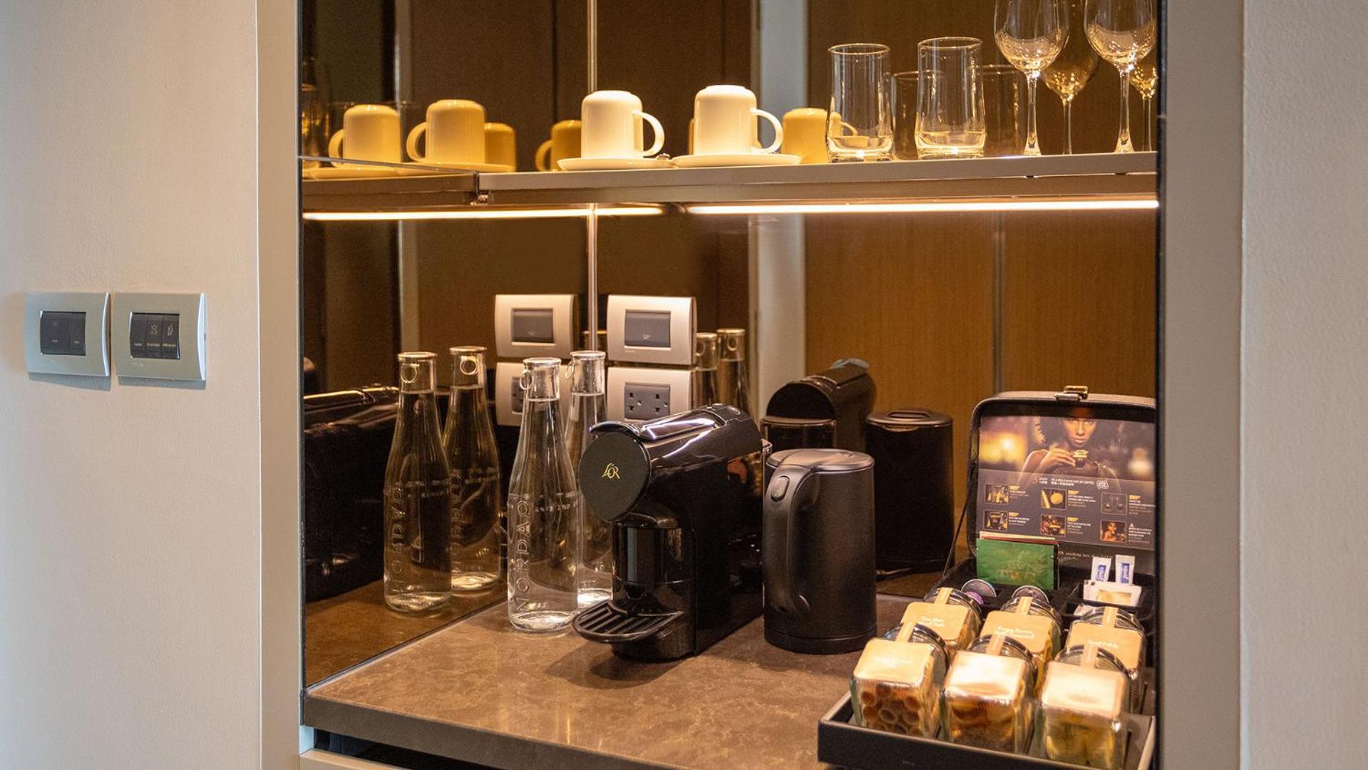 Chatrium Grand Bangkok Luaran gambar A Nespresso machine in a hotel room
